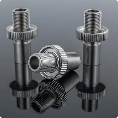 Precision machined threaded metal fittings